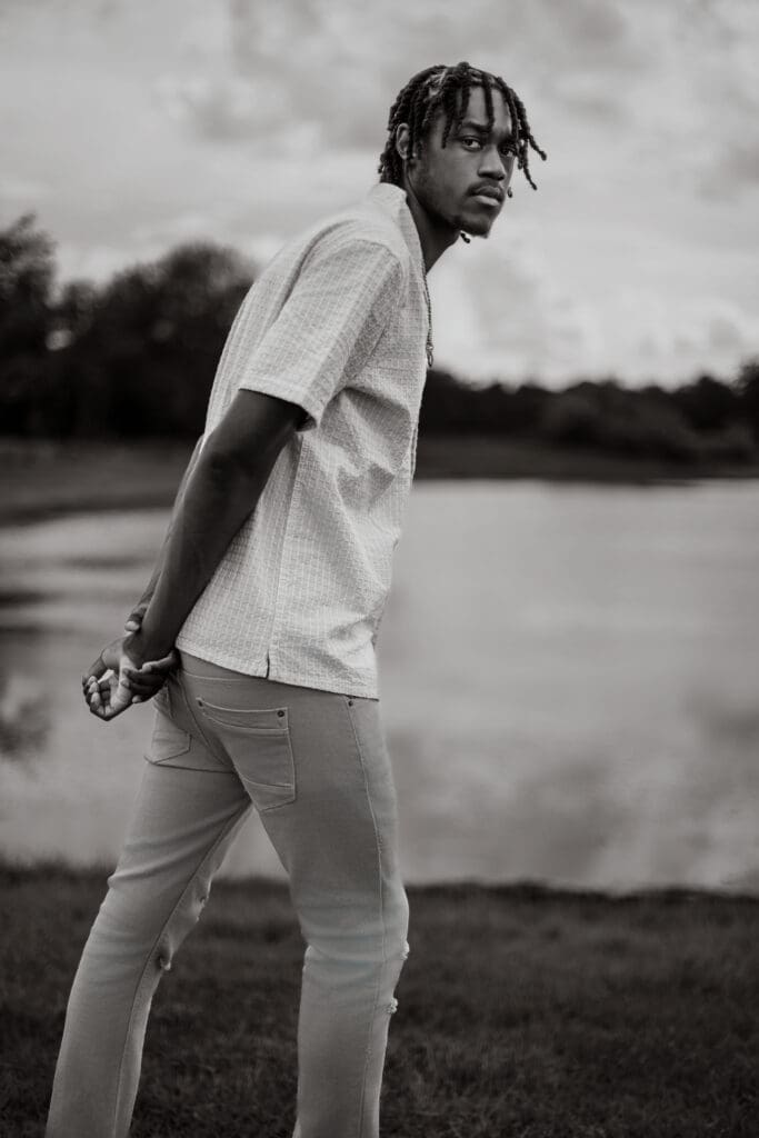 Outdoor senior portrait captured along one of Atlanta's many natural waterfront locations.
